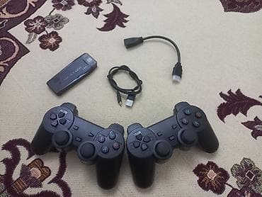 Продаю игровую приставку Game Stick Lite 4K. Состояние хорошее — 1