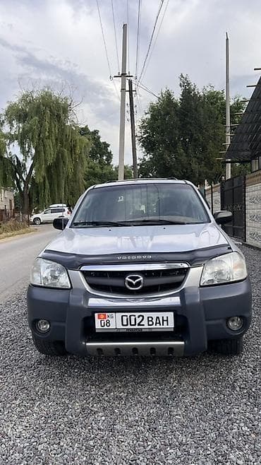 с люком: Mazda Tribute: 2002 г., 2 л, Механика, Бензин, Кроссовер — 1