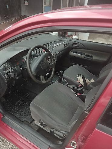 soma fix: Mitsubishi Lancer: 2004 г., 1.6 л, Механика, Бензин, Универсал — 6