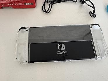 Техника и электроника: Продаю прошитый Nintendo Switch Oled В идеальном состоянии, полный — 4