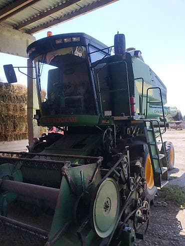 Унаа: Комбайн John Deere с жатками Описание: - Зерноуборочный комбайн John — 8