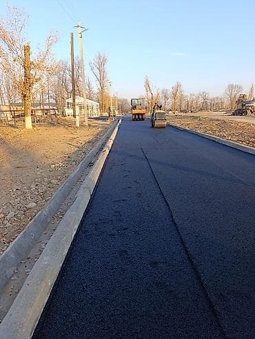 Асфальтирование дорог и площадок - Устройство асфальтобетонного