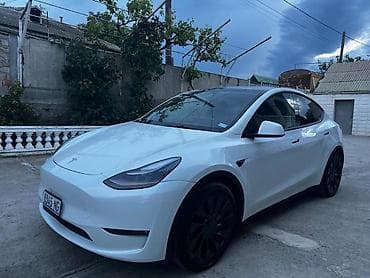 Tesla Model Y: 2023 г., 4.4 л, Автомат, Электромобиль, Кроссовер — 1