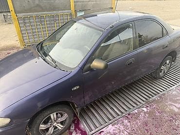 мотор жасайбыз: Mazda 323: 1997 г., 1.6 л, Кол менен иштөөчү, Бензин, Седан — 1