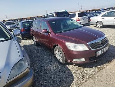 6: Skoda Octavia: 2012 г., 1.6 л, Механика, Бензин, Универсал — 7