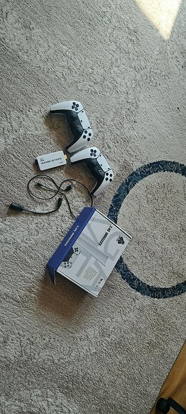 Xbox One: Игровая приставка Game Stick 4K с двумя беспроводными геймпадами — 1