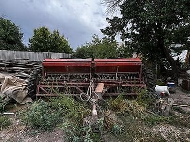 Зерновая сеялка прицепная (ширина захвата около 4–5 м), механическая — 5
