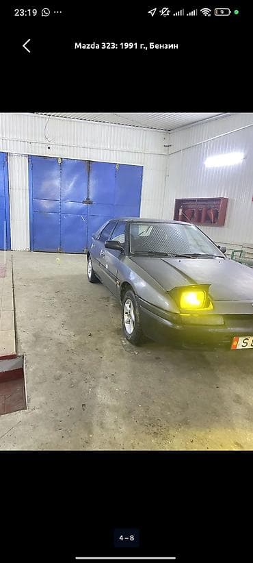 hyundai genesis: Mazda 323: 1991 г., 1.8 л, Механика, Бензин, Хэтчбэк — 4