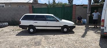 кпп тди: Volkswagen Passat: 1988 г., 1.8 л, Кол менен иштөөчү, Бензин, Универсал — 3