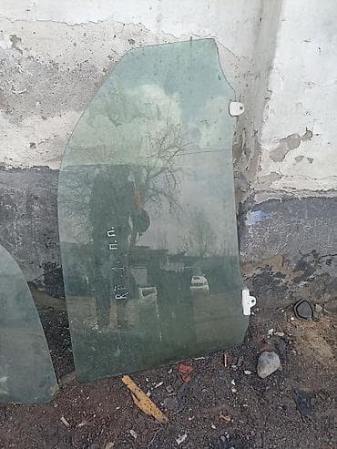 Детали ходовой части: Нексия стекло левый — 1