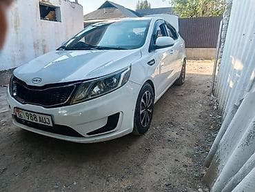 Унаа: Kia Rio: 2014 г., 1.6 л, Кол менен иштөөчү, Бензин, Седан — 2