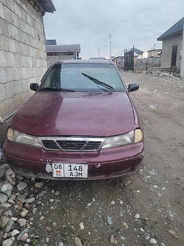 corolla e150: Легковой автомобиль седан бордового цвета с киргизскими номерными — 1