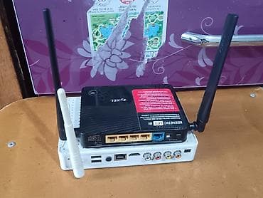 Модемы и сетевое оборудование: Маршрутизатор Zyxel Keenetic Lite III + ТВ-приставка (сетевой — 2