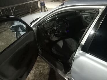 домкрат мазда: Mazda Cronos: 1992 г., Седан — 5