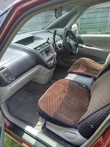 лабо 2004: Toyota Opa: 2001 г., Универсал — 7