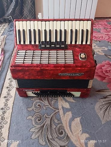 Аккордеон Weltmeister, красный перламутровый корпус. Характеристики и