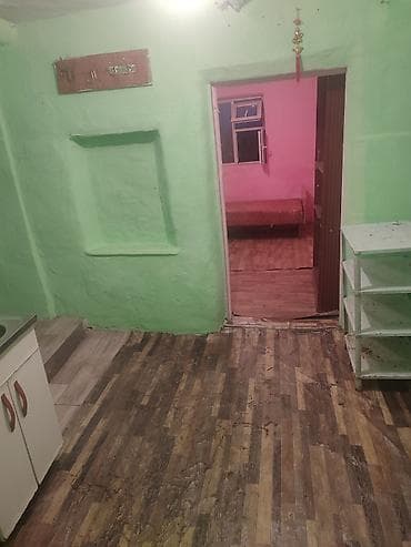 квартира на цокольном этаже: Двухкомнатная помещение с кухонной зоной Описание: - Планировка — 6