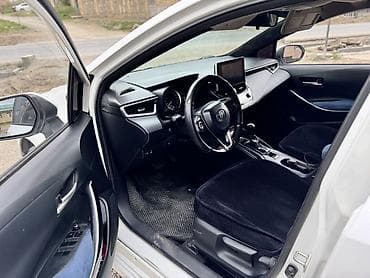 e6 3: Toyota Corolla: 2019 г., 1.8 л, Вариатор, Гибрид, Седан — 5