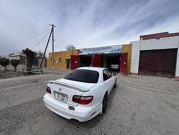 дорогие машины: Mazda Millenia: 1999 г., Седан — 7