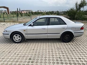 down pipe: Mazda 626: 1998 г., 2 л, Механика, Бензин, Седан — 3