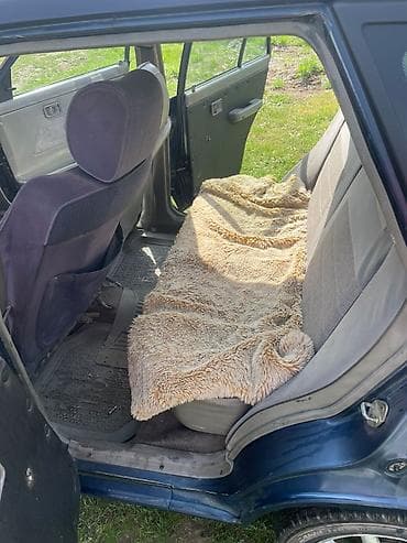 bid e2: Kia Avella: 2000 г., 1.3 л, Автомат, Бензин, Универсал — 5