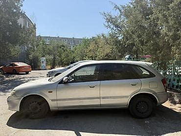 Mazda 323: 2001 г., 1.5 л, Автомат, Бензин, Универсал — 2