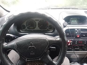дом обмен на авто: Mitsubishi Carisma: 2003 г., 1.8 л, Механика, Бензин — 1