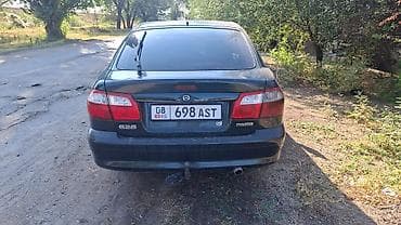 Mazda 626: 2000 г., 1.8 л, Кол менен иштөөчү, Бензин, Хетчбек — 1