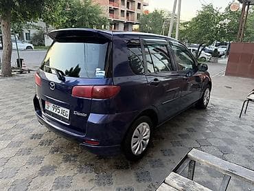 Mazda Demio: 2005 г., 1.3 л, Автомат, Бензин, Хэтчбэк — 2