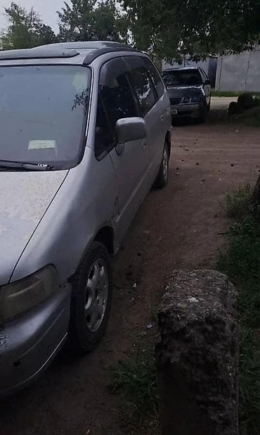 byd e7: Honda Odyssey: 1994 г., 2.2 л, Автомат, Бензин, Минивэн — 2