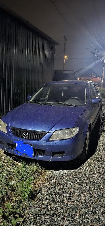 Унаа: Mazda 323: 2002 г., 1.6 л, Кол менен иштөөчү, Бензин — 1