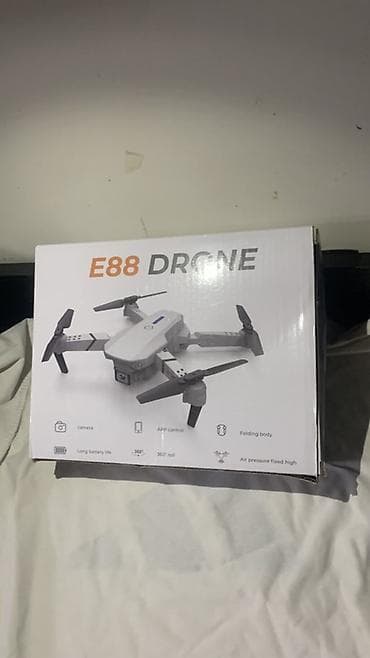 ufc диск: Квадрокоптер E88 DRONE (14+) - Складная конструкция: компактные лучи — 2