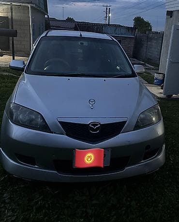 гов 2: Mazda Demio: 2004 г., 1.3 л, Автомат, Бензин, Хэтчбэк — 4