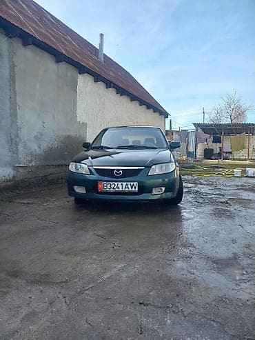 одмен машина: Mazda 323: 2002 г., 1.6 л, Механика, Бензин, Универсал — 3