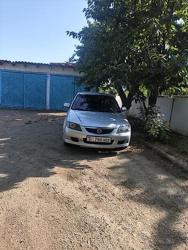 5: Mazda Familia: 2003 г., 1.6 л, Механика, Бензин, Универсал — 1