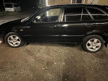 салон жасайбыз: Mazda 323: 2001 г., 1.6 л, Кол менен иштөөчү, Хетчбек — 9