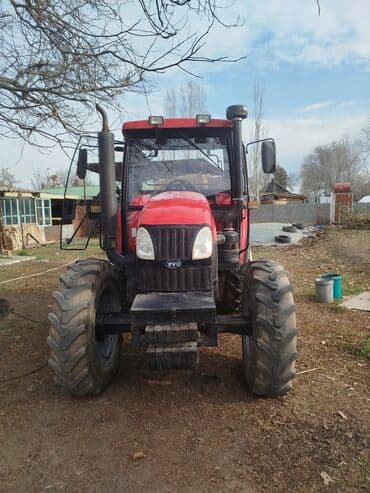 домкрат 5т: Трактор колесный YTO LX954 - Модель: YTO LX954 (надпись на капоте) - — 1