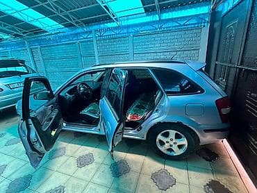 мазда хронос: Mazda 323: 2000 г., 1.5 л, Механика, Бензин, Хэтчбэк — 4