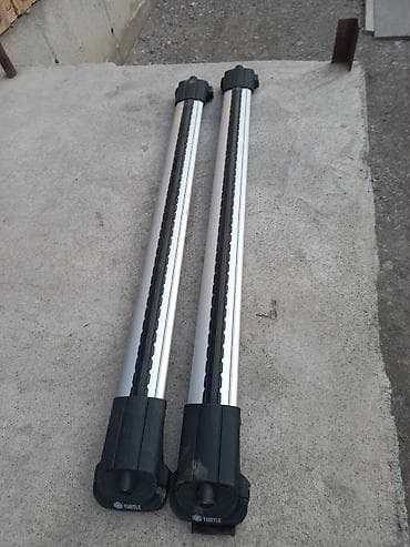 Багажники на крышу и фаркопы: Поперечные дуги На рейлинги — 1