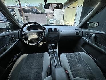 Mazda 323: 1999 г., 1.5 л, Автомат, Бензин, Хэтчбэк — 6
