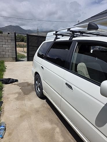 одиссей сиденья: Honda Odyssey: 2000 г., 2.3 л, Автомат, Минивэн — 9