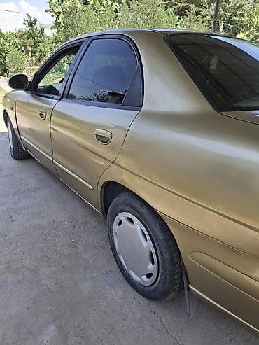 Унаа: Daewoo Nubira: 2000 г., 1.5 л, Кол менен иштөөчү, Бензин, Седан — 4