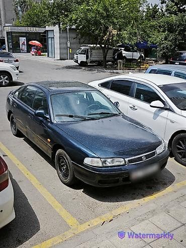 Транспорт: Mazda 626: 1996 г., 2 л, Механика, Бензин, Хэтчбэк — 1