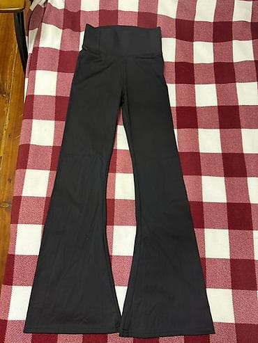 Прокат одежды: Женские черные расклешённые леггинсы/брюки с высокой посадкой - — 5