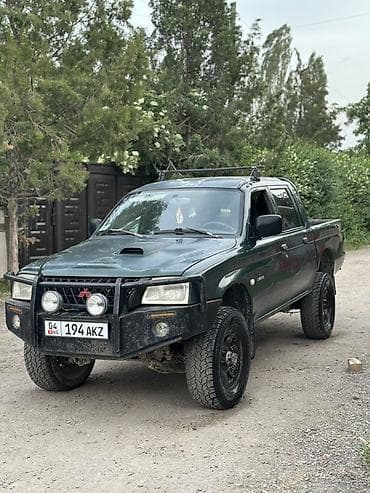 шины lt: Mitsubishi L200: 2002 г., 2.5 л, Механика, Бензин, Пикап — 8