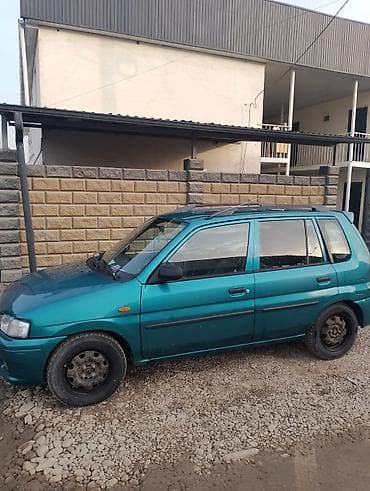 deu labo: Mazda Demio: 1999 г., 1.3 л, Механика, Бензин, Минивэн — 4