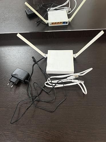 Модемы и сетевое оборудование: Wifi роутер Tp link с 4 портами на 300мб В хорошем состоянии, все — 1