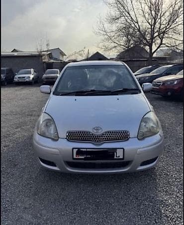 Toyota Vitz: 2003 г., 1.2 л, Автомат, Бензин, Седан
