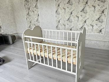 Детский мир: Детская кроватка-манеж из дерева. - Размер спального места — 3