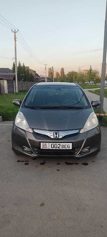Honda Fit: 2012 г., 1.4 л, Автомат, Бензин, Хэтчбэк